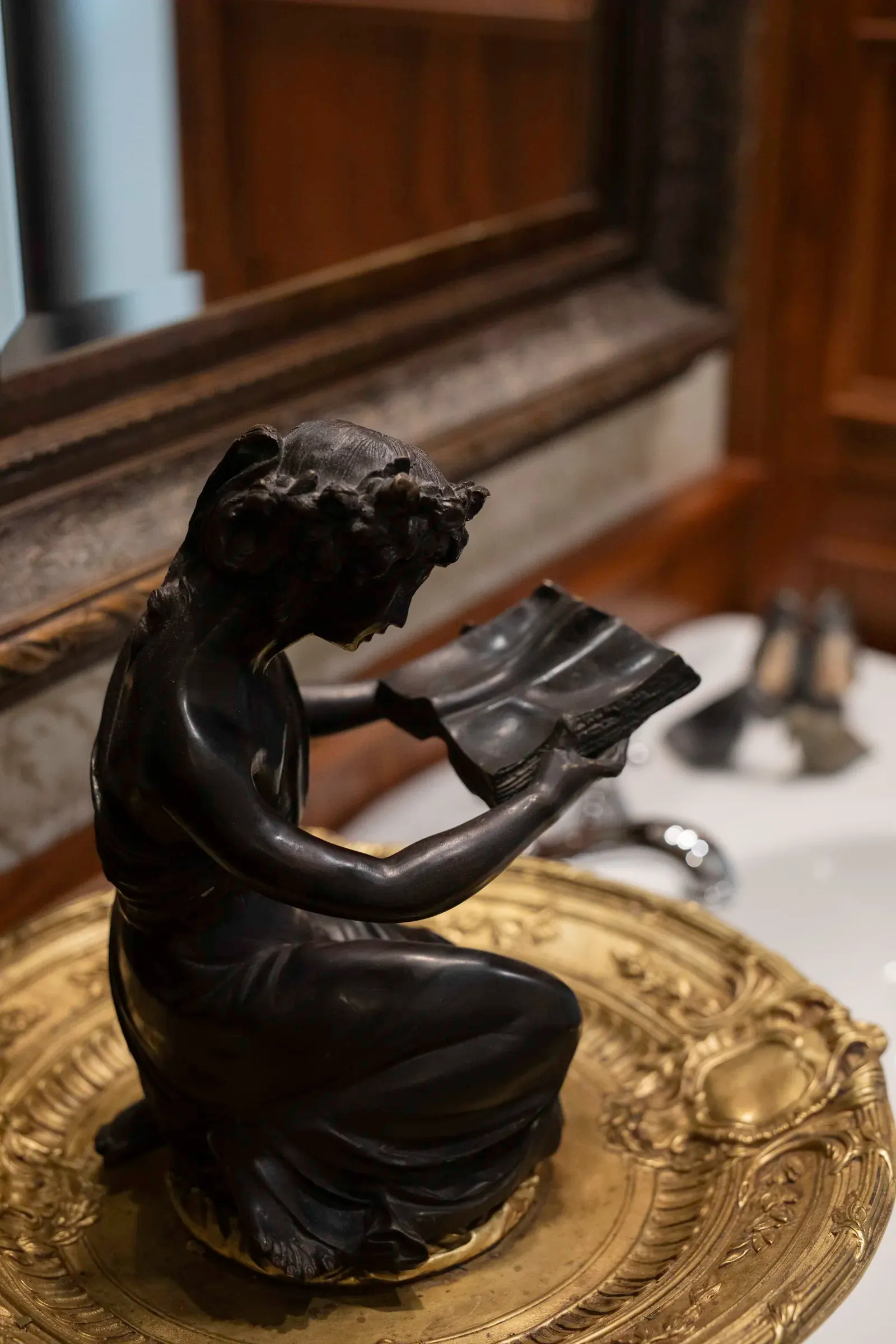 Decorative bathroom accessory against custom woodwork